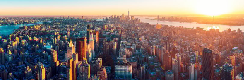 City landscape with setting sun