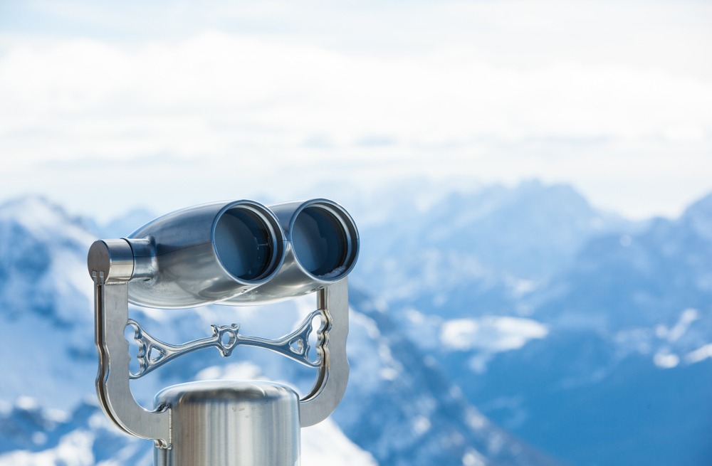 EquityZen 2018 IPO Outlook with binoculars looking over mountain