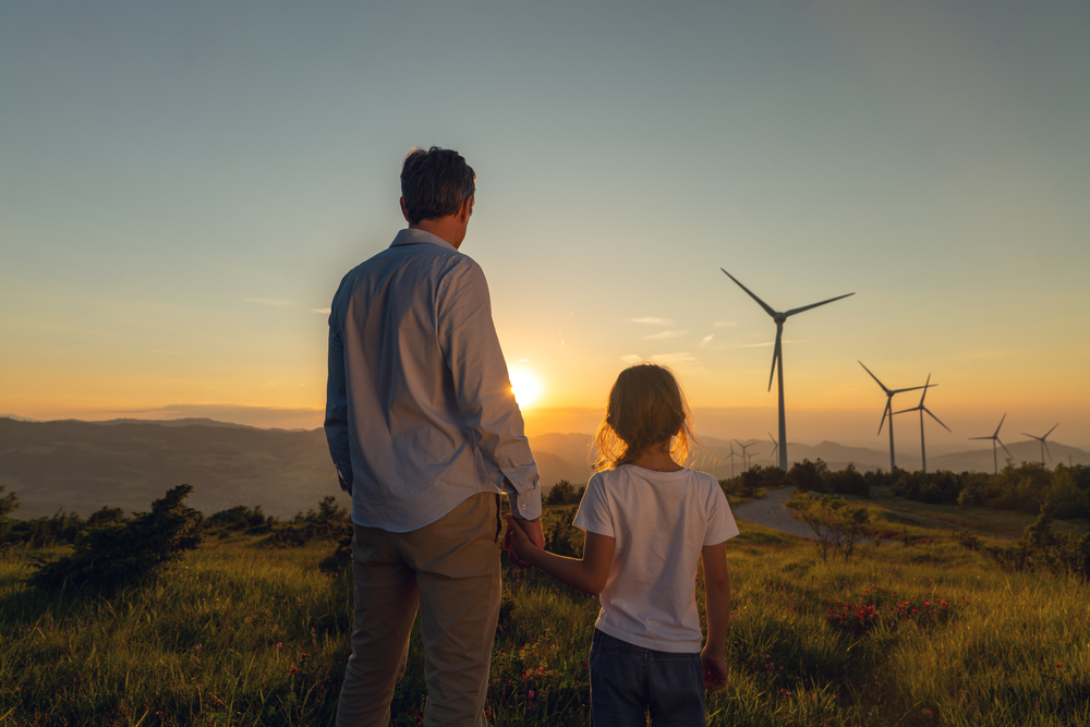 EquityZen 2021 VC Backed IPO shortlist with girl and father overlooking renewable energy in field